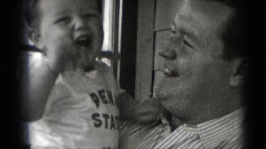 1947: father is seen playing with children MIDDLETOWN