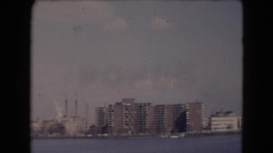 1947: city is seen with tall buildings along coastal area MIDDLETOWN