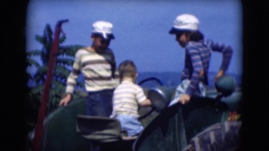 1947: little boy is having driving car with his siblings MIDDLETOWN