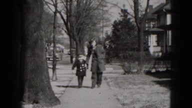 1949: father is seen playing with children MIDDLETOWN