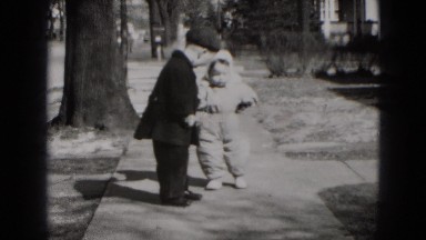 1949: little boy is helping to the little girl to walk MIDDLETOWN