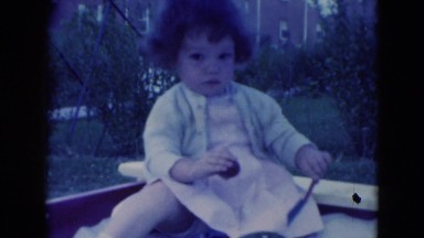 1949: spoiled young toddler girl playing sandbox MIDDLETOWN