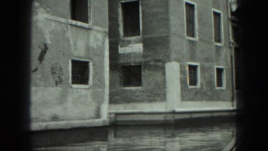 1949: the historic city of venice as seen from moving gondola VENICE, ITALY