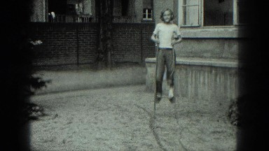 1949: Child Walking on Stilts in Venice, Italy