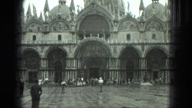 1949: People Walking in Open Space in Front of Huge Building, VENICE, ITALY