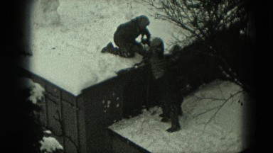 1951: Children Playing in Snow Near Snow-Covered House in Milwaukee, Wisconsin
