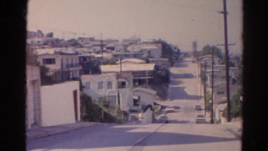 1966: city is seen with tall buildings along coastal area CALIFORNIA