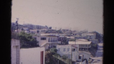 1966: city is seen with tall buildings along coastal area CALIFORNIA