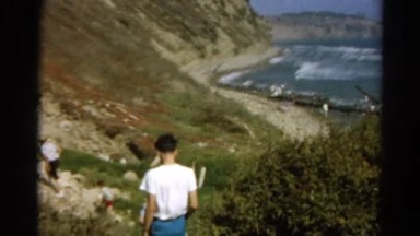 1966: Family Walking Along California Beach Coastal Vacation