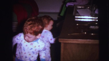 1973: Children with Red Hair in Matching Pajamas Playing in Lynbrook, New York