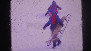 1974: snow playing is seen LYNBROOK, NEW YORK