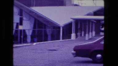 1976: Motel Holidome Style Building Indoor Pool Recreation Center Lounge Area