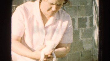 1968: woman holding kitten DILLER, NEBRASKA