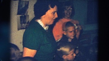 1968: surprise christmas celebration with santa with lots of kids. DILLER