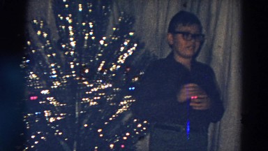 1968: christmas tree is seen with child opening presents DILLER, NEBRASKA