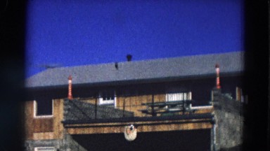1968: modest residential house on clear blue day with killer view DILLER