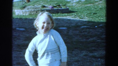1968: charming little blonde girl in white shirt outdoor DILLER, NEBRASKA