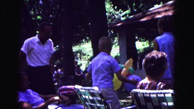 1971: sitting in outdoor fold up lounge chairs at family reunion OMAHA, NEBRASKA