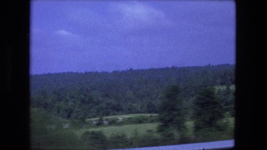 1976: driving over natural landscape area green forested wooded zone FORT WAYNE