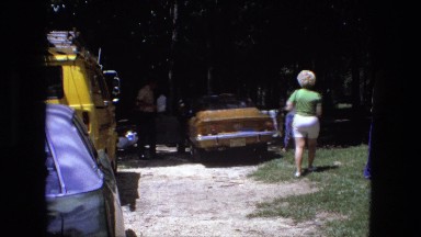 1976: picnic party getting out of the car in beautiful destination FORT WAYNE