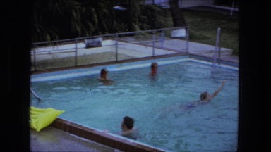 1976: people having a good time at swimming pool