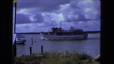 1976: ship passing by dock FORT WAYNE, INDIANA
