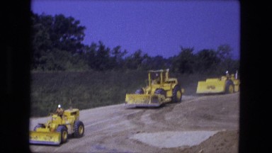 1976: yellow caterpillar bulldozer earth mover industrial vehicle driving around