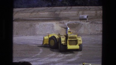 1976: caterpillar yellow bulldozer earth mover industrial vehicle driving around