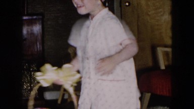 1957: little girl is spinning around with her toy HICKSVILLE, NEW YORK