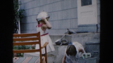 1957: Little Girls Play Pretend Kitchen Games in Backyard Hicksville, New York
