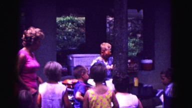 1971: Kids in Playroom Wandering While Lady Monitors Them Omaha