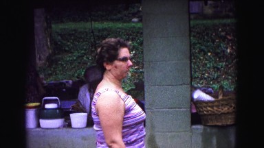 1971: woman in purple and white top outdoor at picnic OMAHA, NEBRASKA