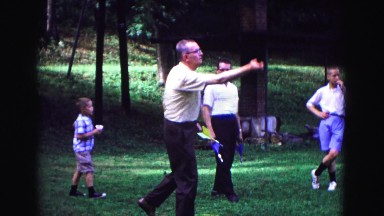 1971: open park man throws large arrows one by one OMAHA, NEBRASKA