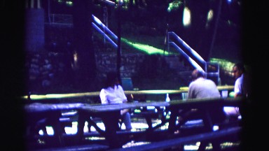 1971: people sitting casually at picnic tables in park OMAHA, NEBRASKA