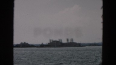 1957: The Beautiful, Majestic, Historic Statue of Liberty as Seen from Moving Vehicle