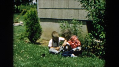 1957: kids are playing outdoor of the house HICKSVILLE, NEW YORK