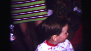 1973: Several Children in Matching Pajamas Play on Floor in Lynbrook, NY