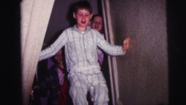 1973: children walking down stairs LYNBROOK, NEW YORK