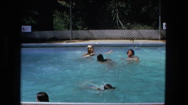 1974: people swimming and playing in the pool FORT WAYNE, INDIANA