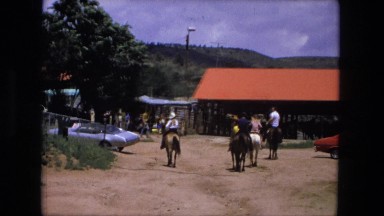 1974: several people ride horses at western style park FORT WAYNE, INDIANA