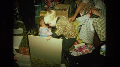 1974: little boys opening christmas presents FORT WAYNE, INDIANA
