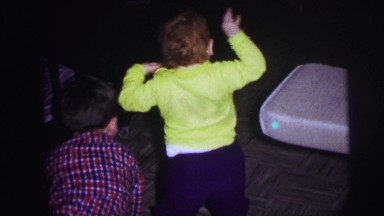 1973: boy first time walking yellow sweater around basement proud moments