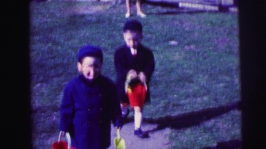 1973: happy kids playing with sand bucket LYNBROOK, NEW YORK