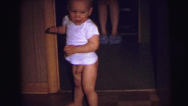 1973: toddlers is seen crawling LYNBROOK, NEW YORK