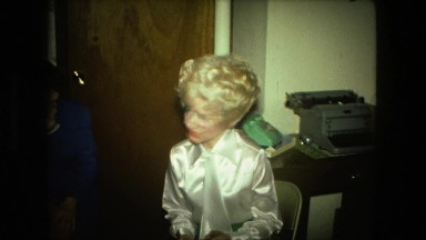 1974: people celebrating someone with gift on special occasion. FORT WAYNE