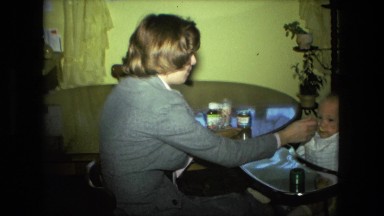 1974: mother feeding infant son baby food FORT WAYNE, INDIANA