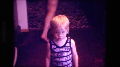 1974: cute kids at dining room table kitchen for breakfast FORT WAYNE, INDIANA