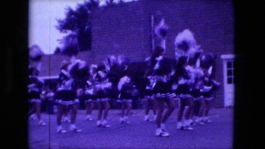 1974: high school cheerleaders participate in parade FORT WAYNE, INDIANA