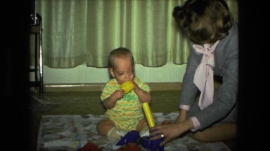 1974: mom is playing with her little son FORT WAYNE, INDIANA