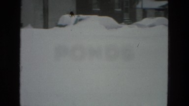 1978: street and cars in the city completely covered by deep fresh snow FRANCE